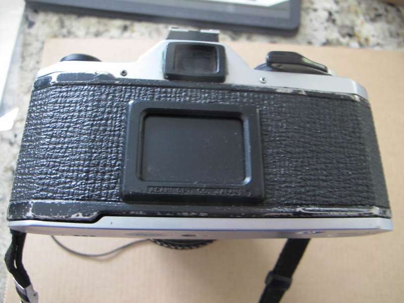 Camera - Pentax MX with Sigma Zoom Master 1:35 -4.5 f35 - 70 mm